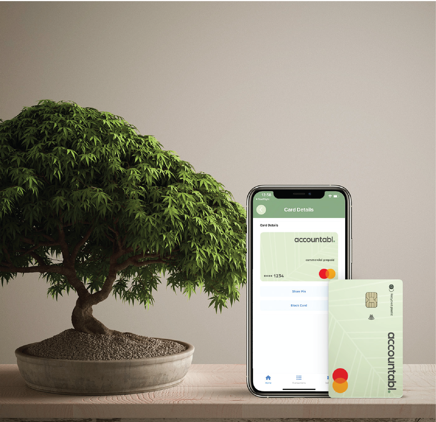 Accountabl mobile app and card with bonsai tree